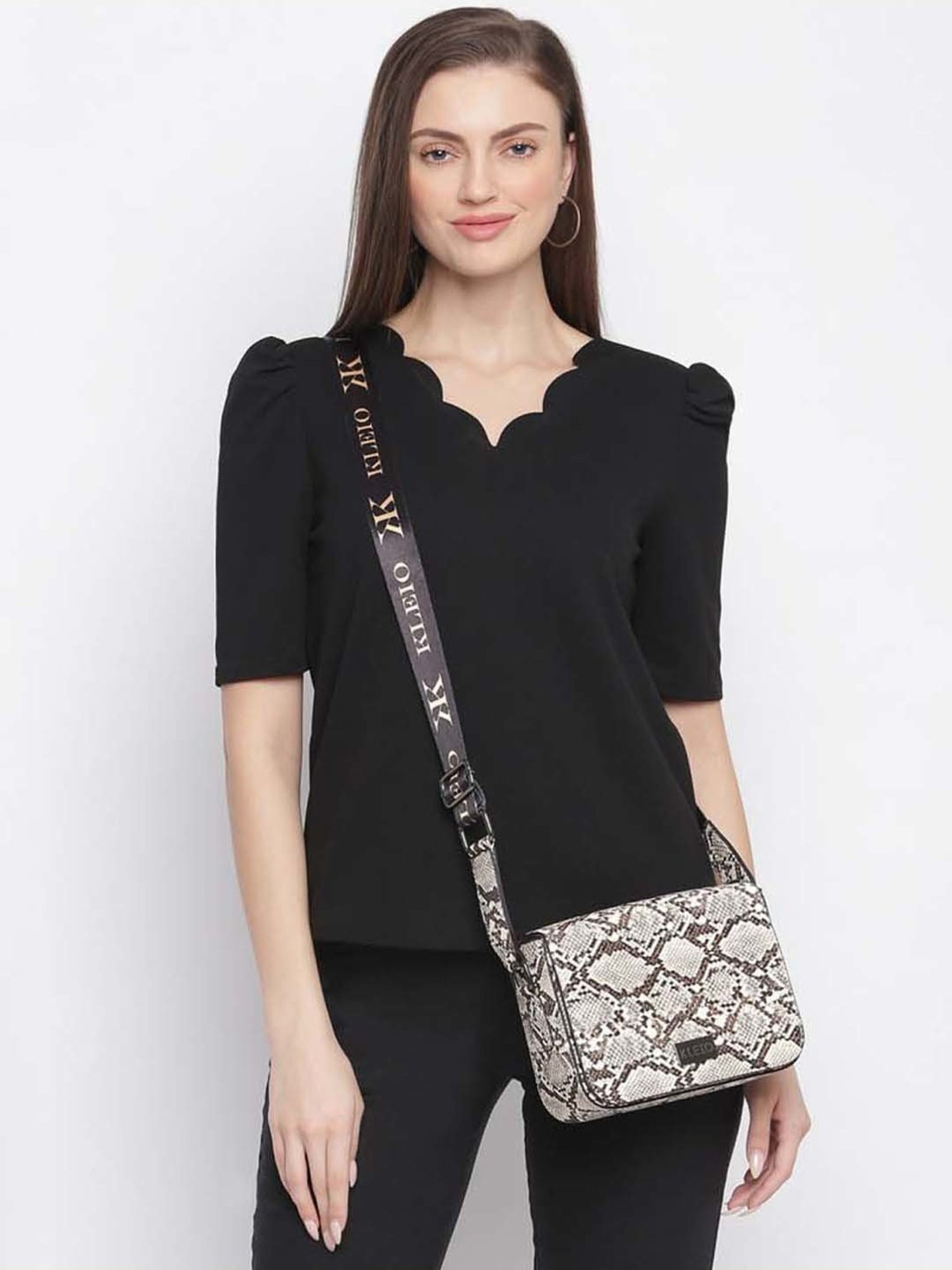 KLEIO Beige Textured Medium Sling Handbag