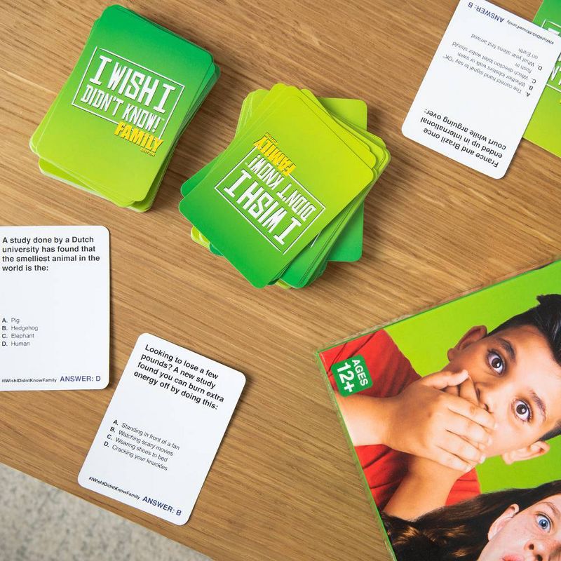 I Wish I Didn't Know! Family Edition Trivia Game by What Do You Meme? Family