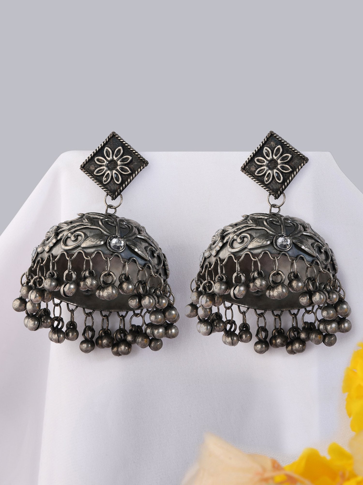 Fida Embossed Dome Shaped Silver Jhumki Earrings