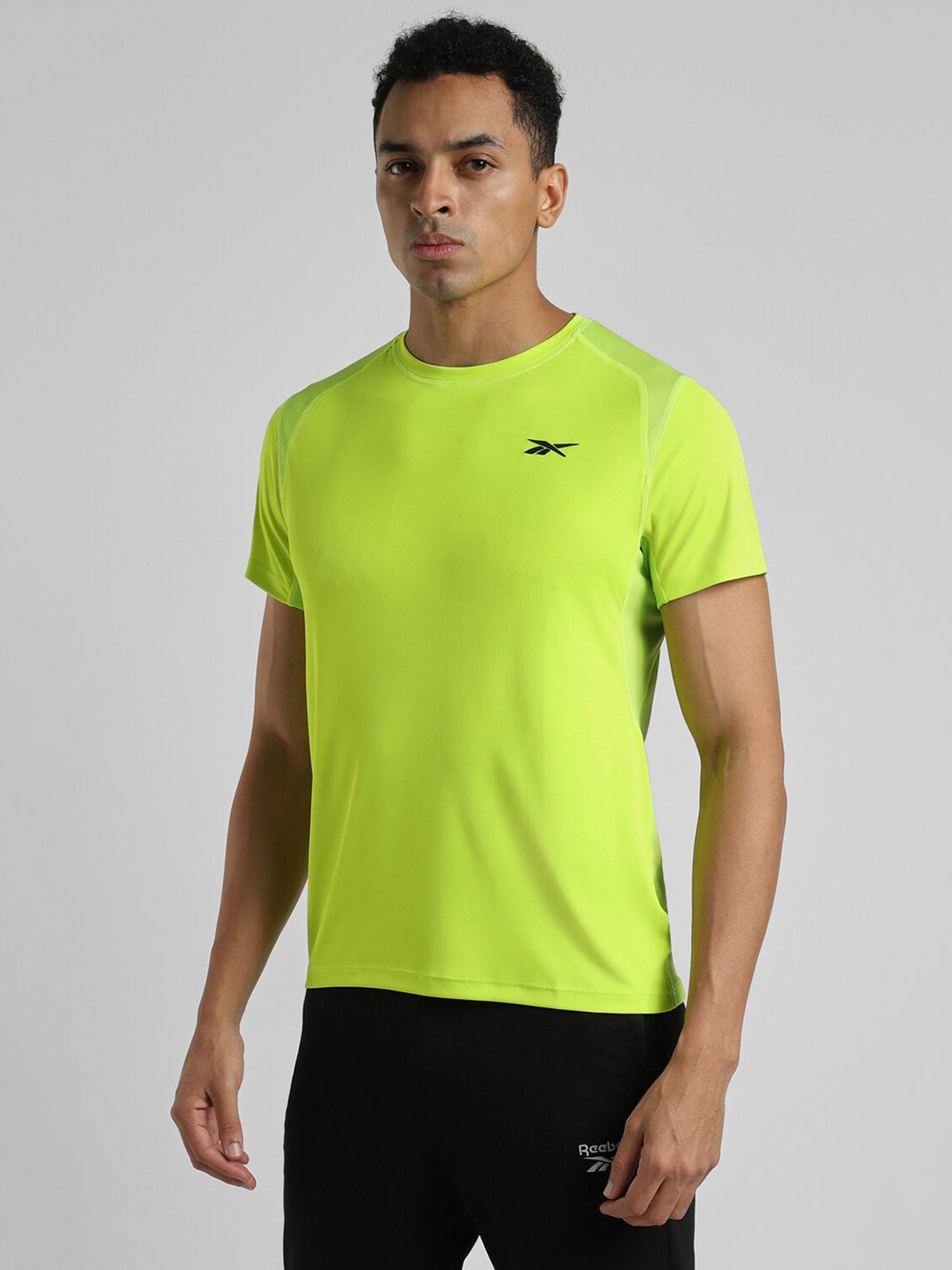 Reebok Green Polyester Regular Fit Solid T Shirt
