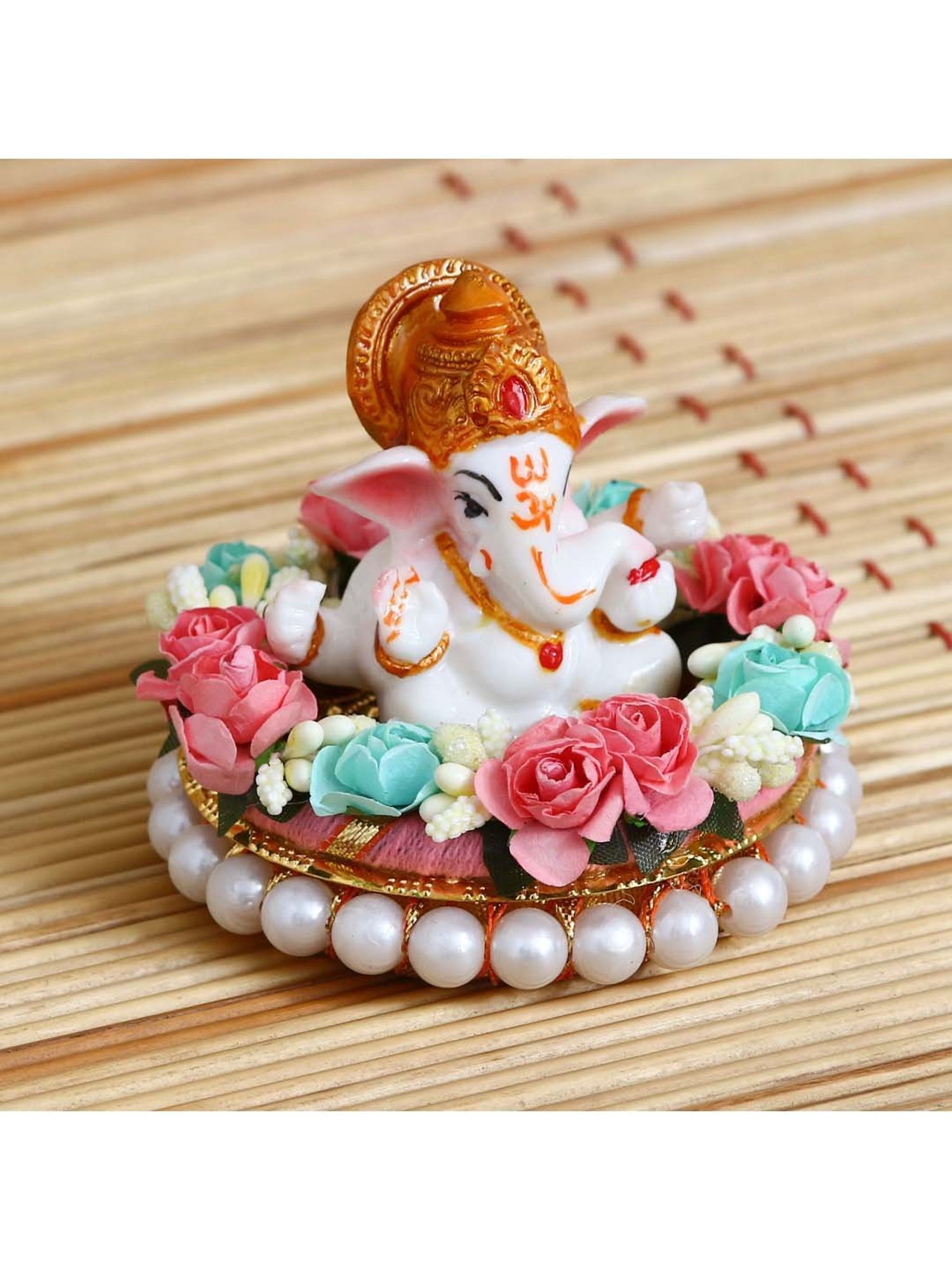 eCraftIndia Lord Ganesha Idol on Decorative Handcrafted Plate with Colorful Flowers