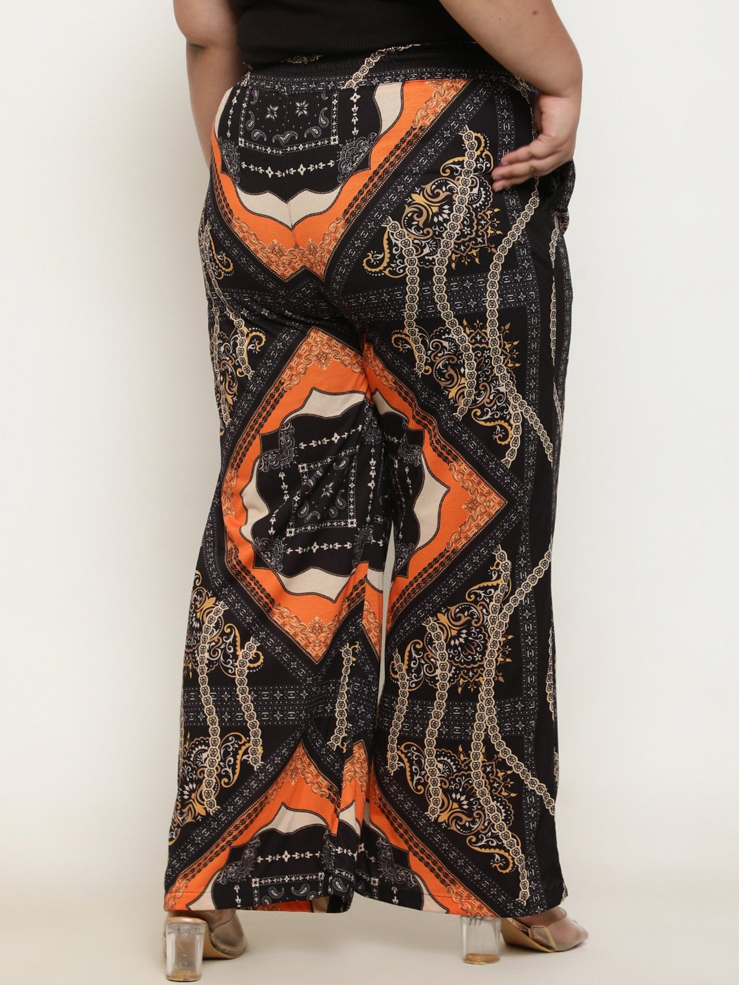 Amydus Black & Orange Printed Flared Fit High Rise Pants