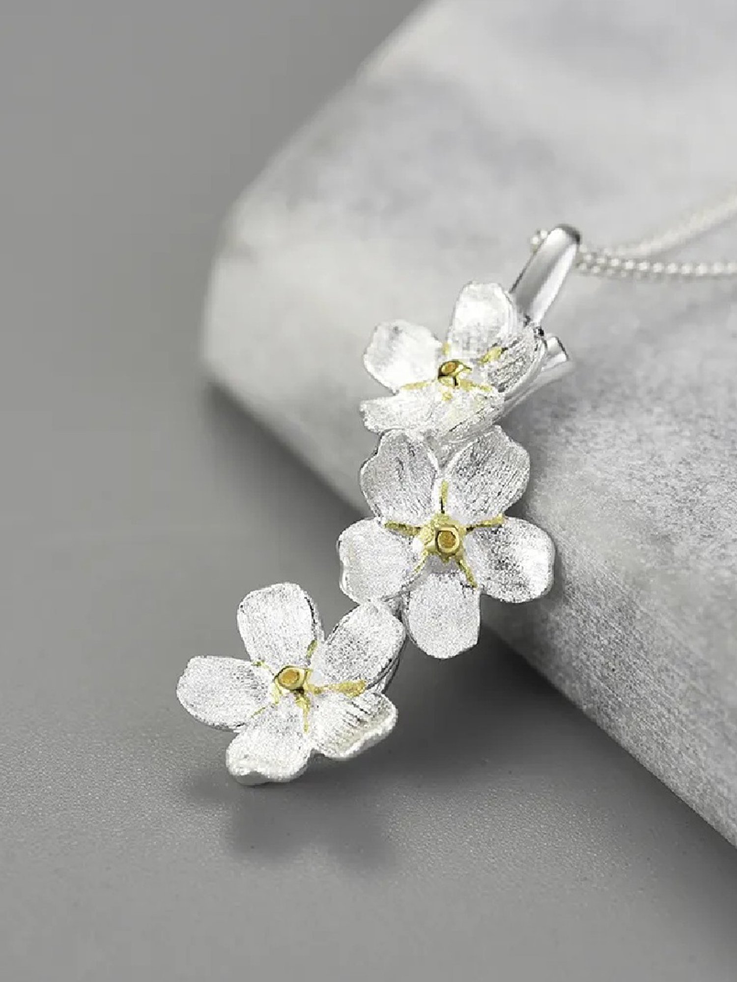 Rihi by P.C. Chandra Jewellers Silver Forget Me Not Flower Pendant (Without Chain)