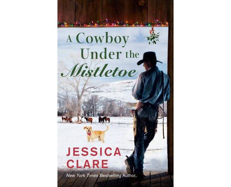 A Cowboy Under the Mistletoe - (The Wyoming Cowboy) by  Jessica Clare (Paperback)