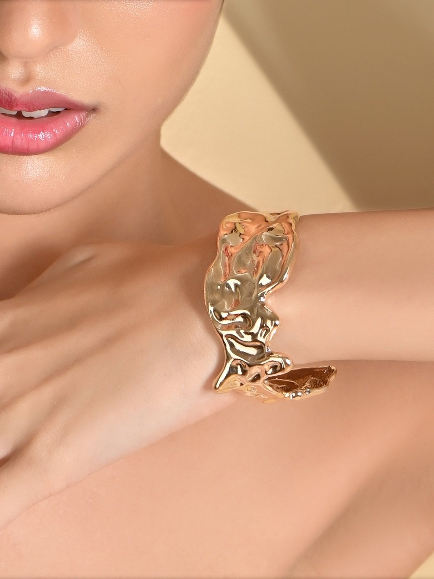 ToniQ Gold Molten Partywear Bangle-style Bracelet for Women