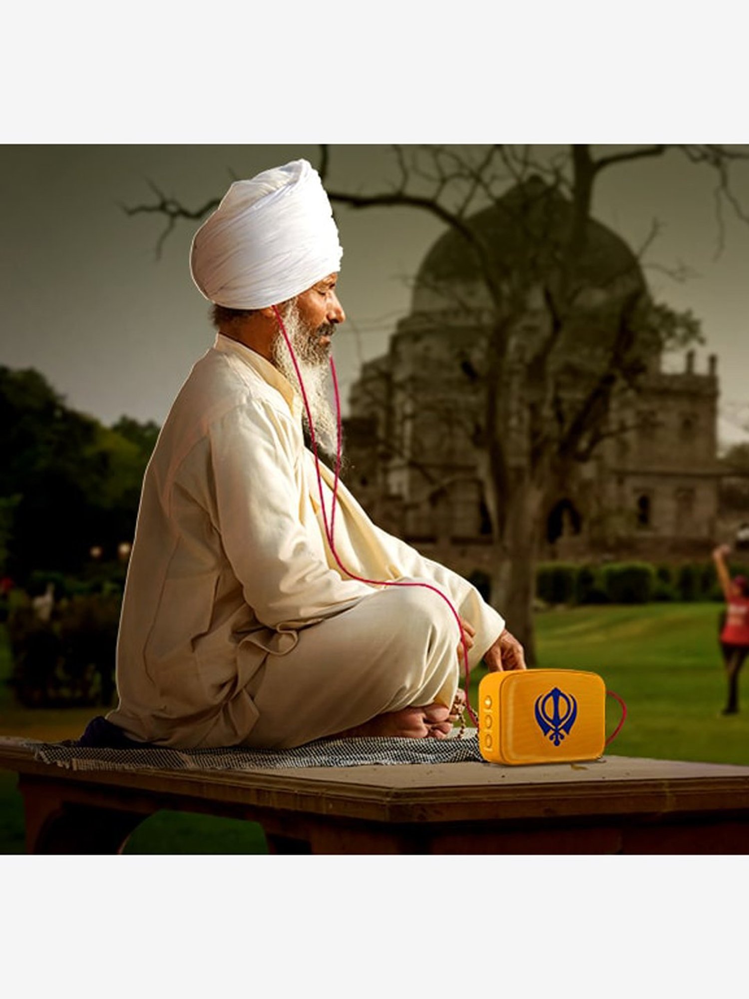 Saregama Carvaan Mini Gurbani SCM02 Bluetooth Speaker (Saffron Orange)