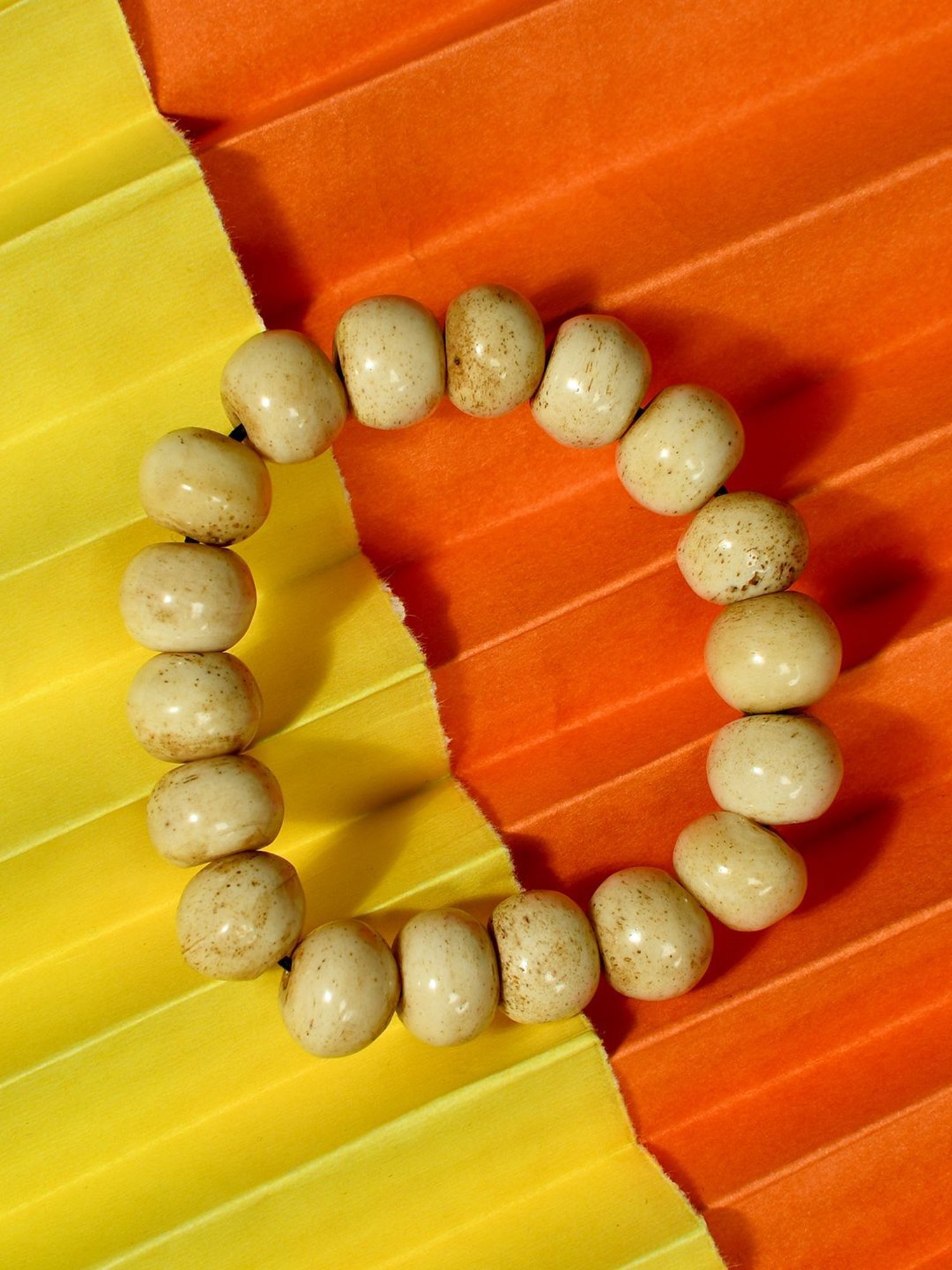 IMLI STREET Off White Artificial Beaded Stretchable Bracelet for Women