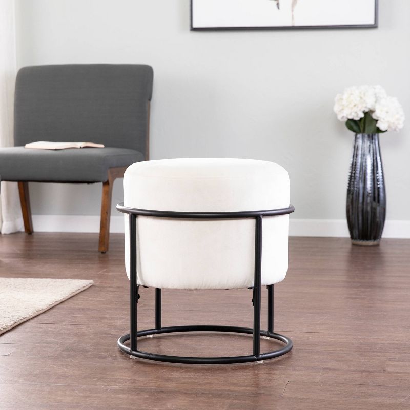 Uplynn Round Upholstered Ottoman Gray/Black - Holly & Martin