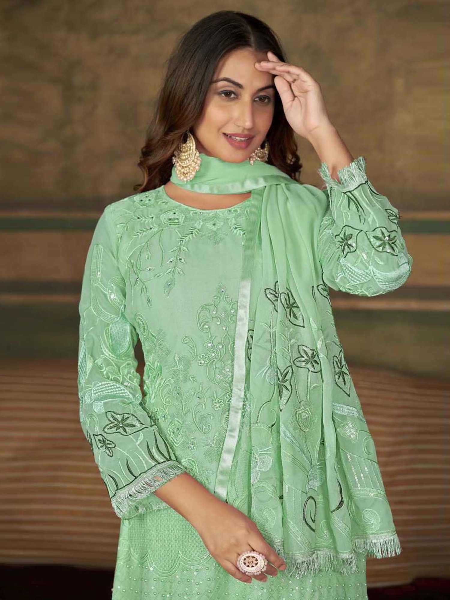 Warthy Ent Green Embroidered Semi Stitched Dress Material