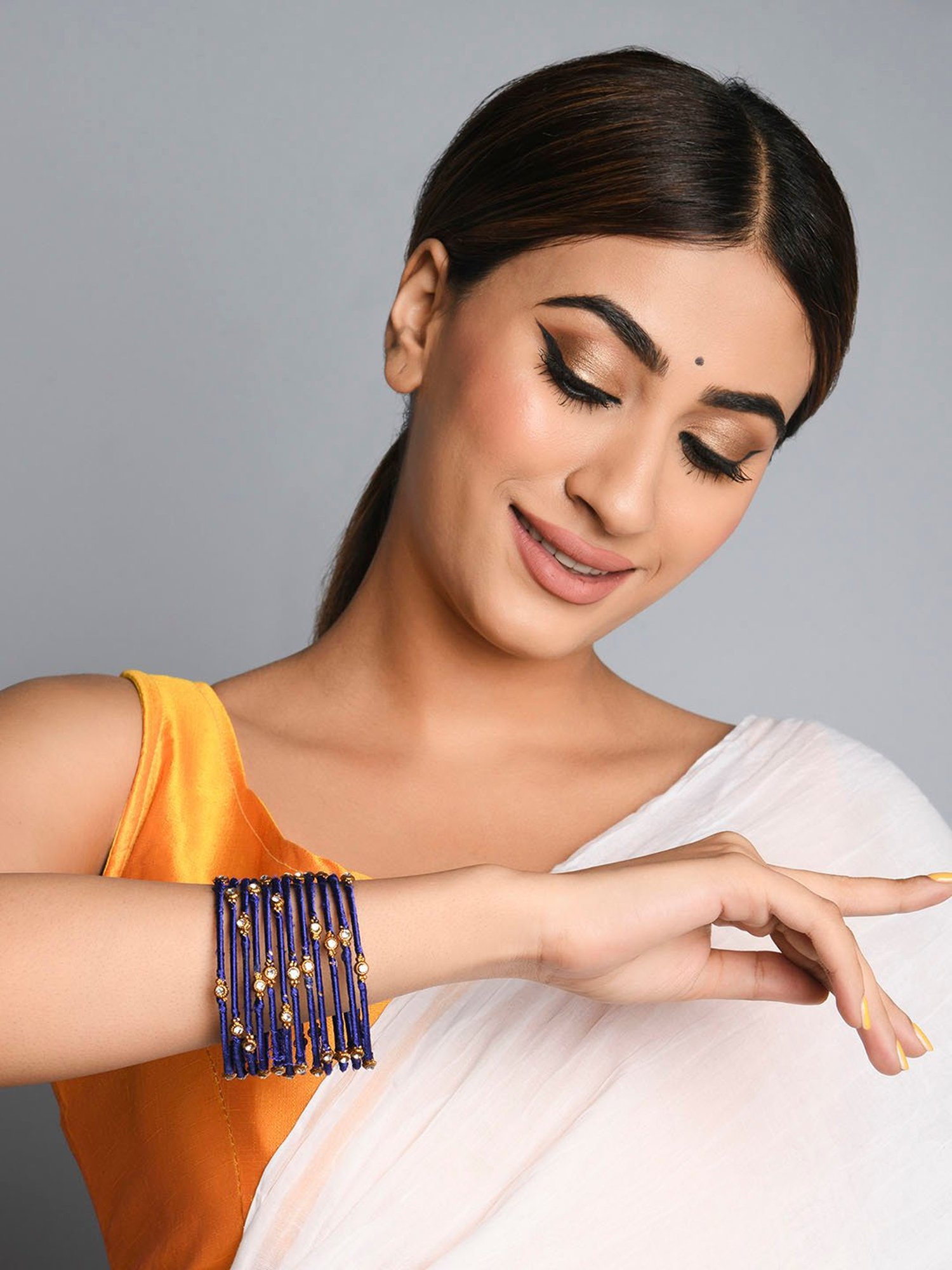 Fida Navy Blue Stones Gold-Plated Silk Thread Bangles for Women - Set of 12