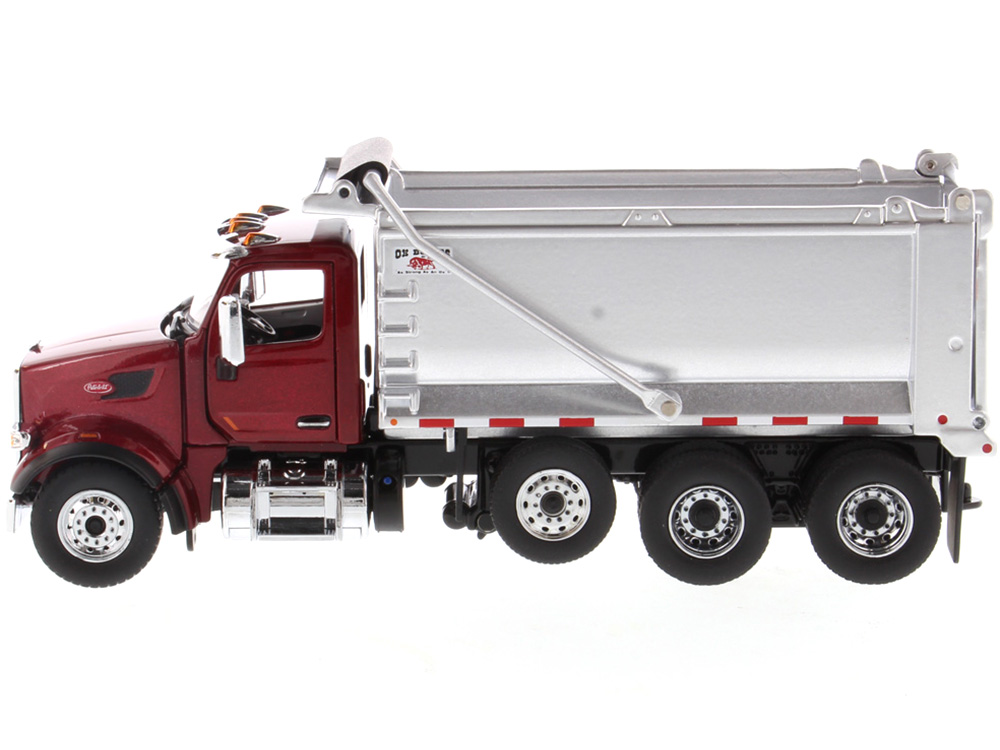 Peterbilt 567 SFFA Tandem Axle with Pusher Axle OX Stampede Dump Truck Red and Chrome "Transport Series" 1/50 Diecast Model by Diecast Masters
