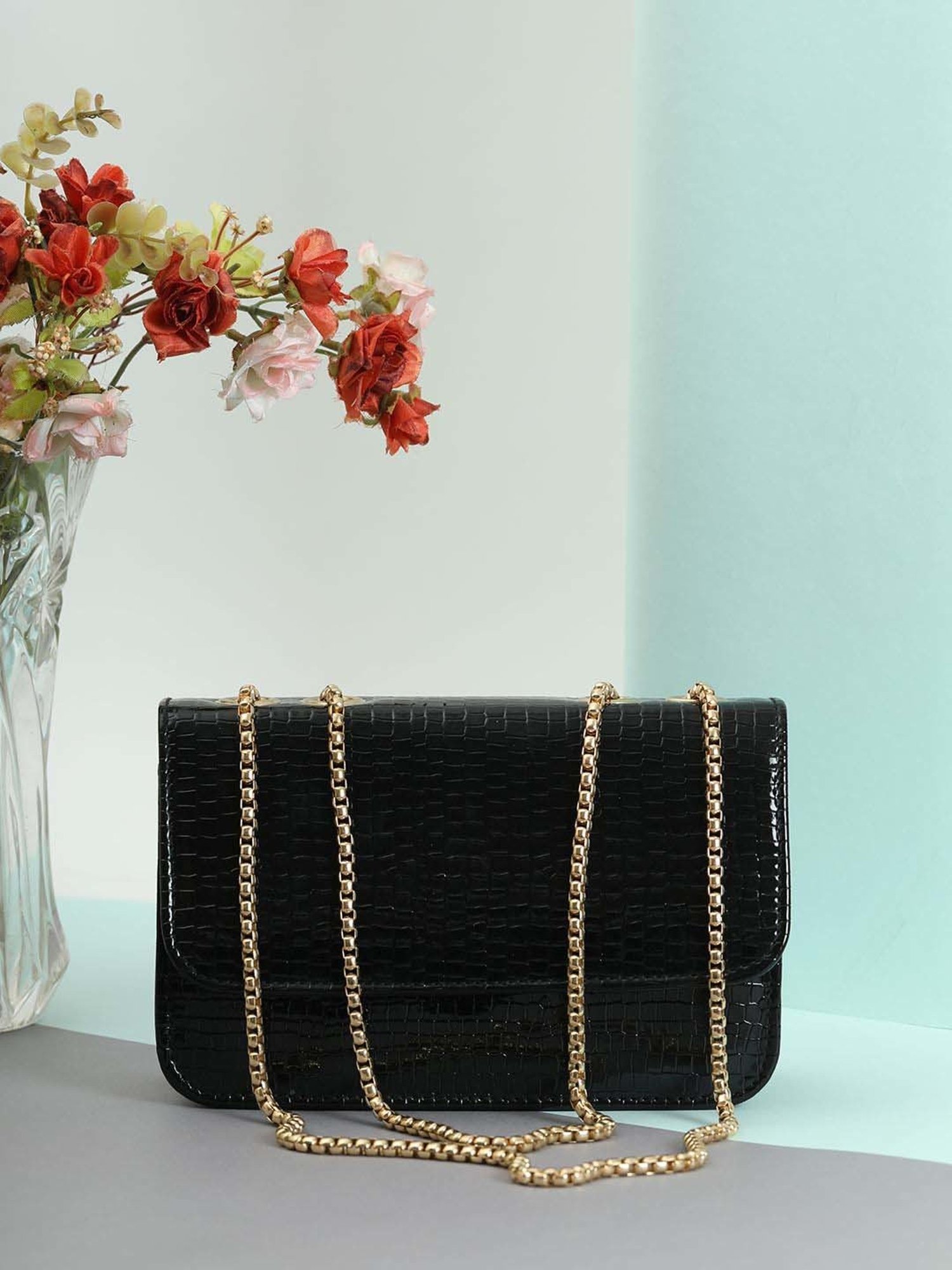 Gaurapakhi Black Textured Small Sling Handbag
