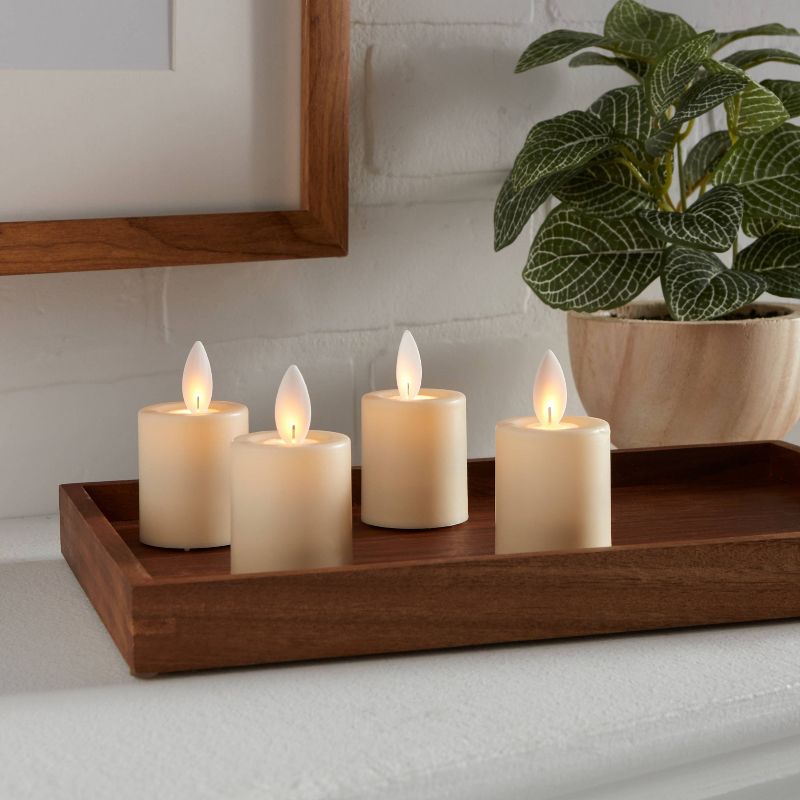 1.50" x 1.75" 4pk LED Votive Flickering Flame Candle Cream - Threshold™