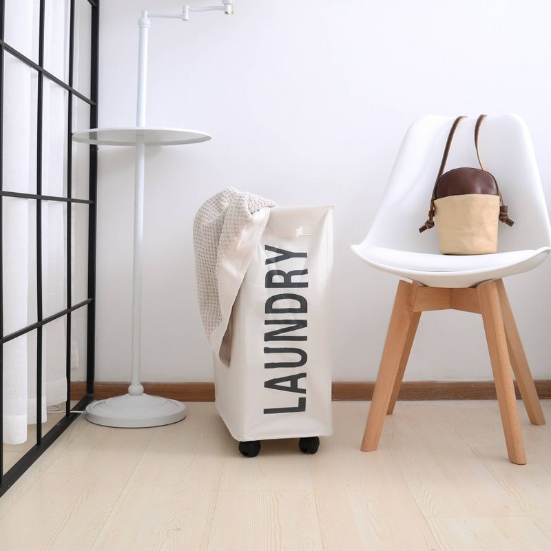 Danya B. Collapsible Waterproof Folding Laundry Hamper on Wheels White