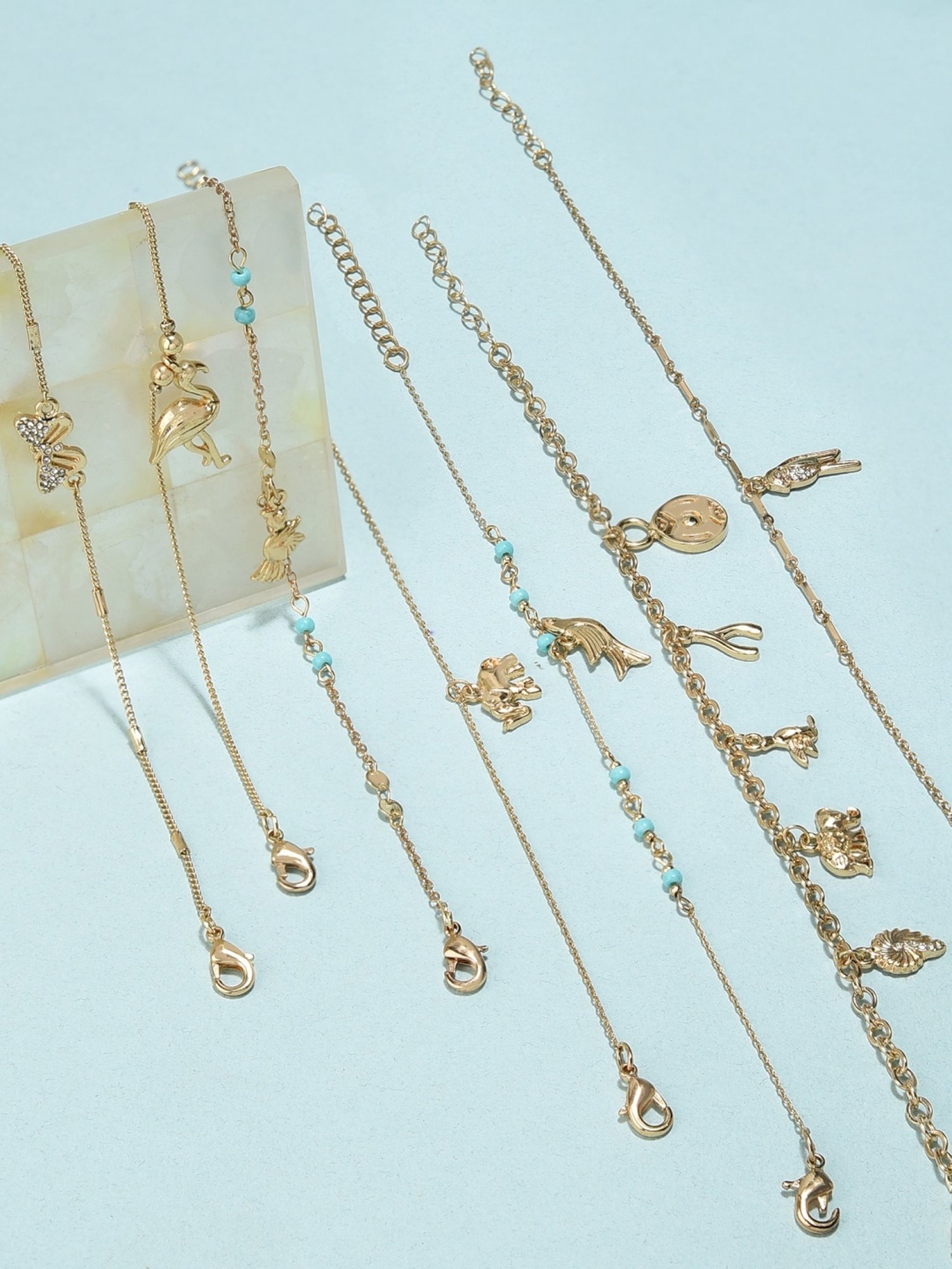 Zaveri Pearls Set of 7 Gold Tone Contemporary Classy Stackable Bracelets-ZPFK11578