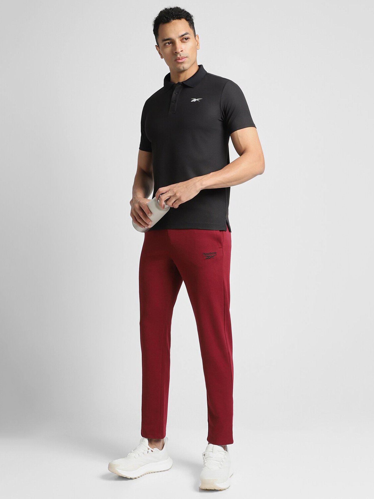 Reebok Black Polyester Slim Fit Solid Polo T-Shirt