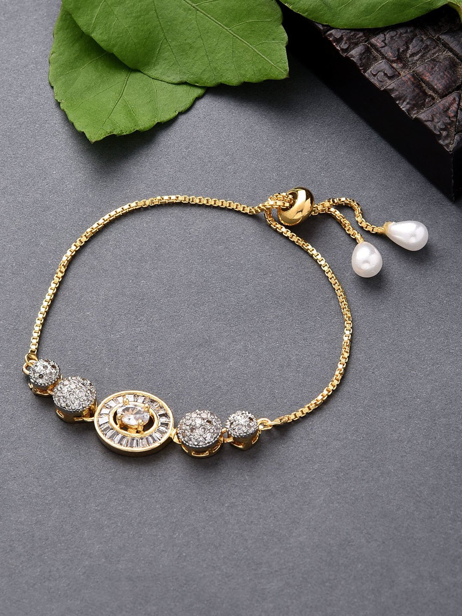 ToniQ Gold-Plated American Diamond Round Charm Bracelet For Women