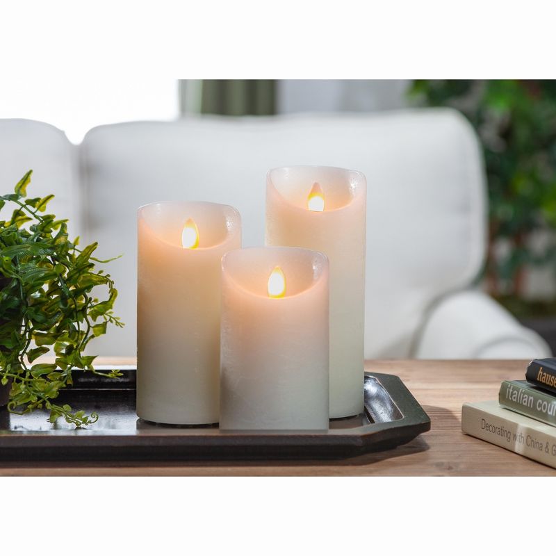 Everlasting Glow Set of Three 3 Ivory LED Pillar Candles with Aurora(R) Flame and Remote Control
