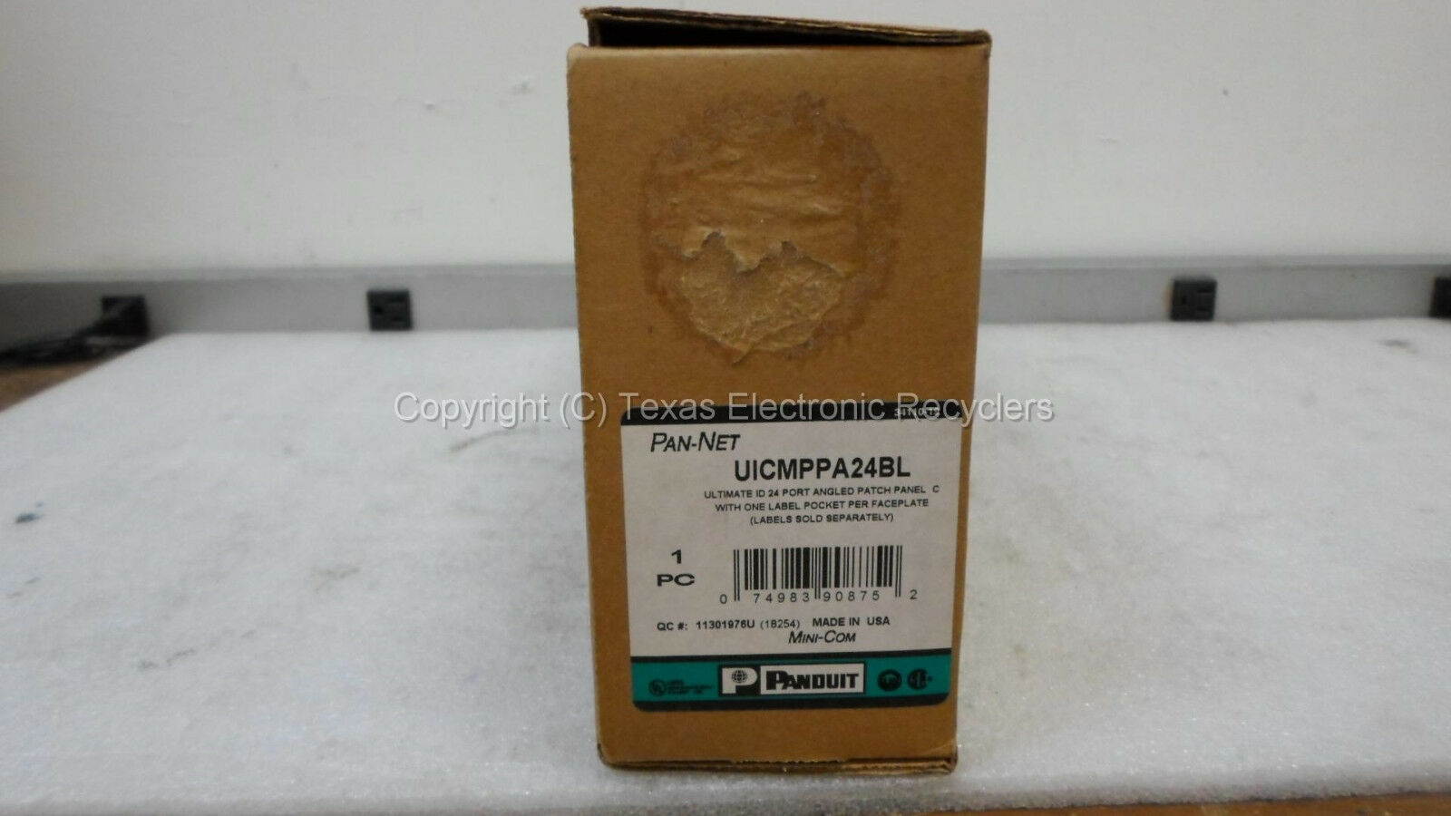 NOB - Panduit CPPLA24WBLY Mini-Com Modular Angled 24-Port Patch Panel