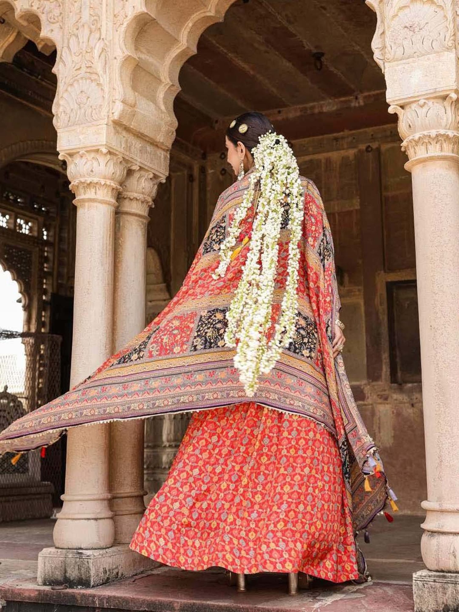 SCAKHI Black & Orange Printed Lehenga Choli Set With Dupatta