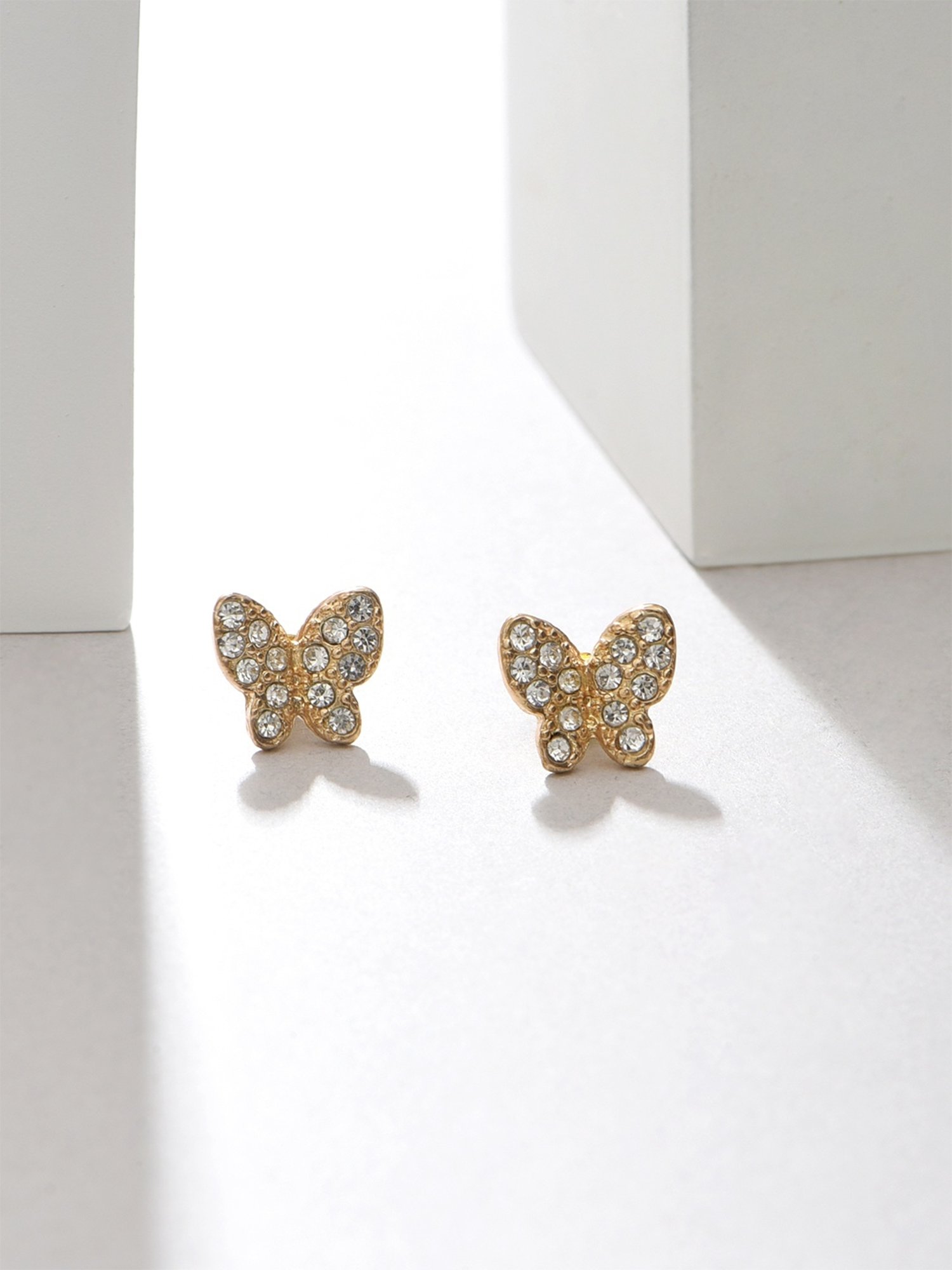 ToniQ Gold-Plated American Diamond Studded Butterfly Stud Earrings for Women