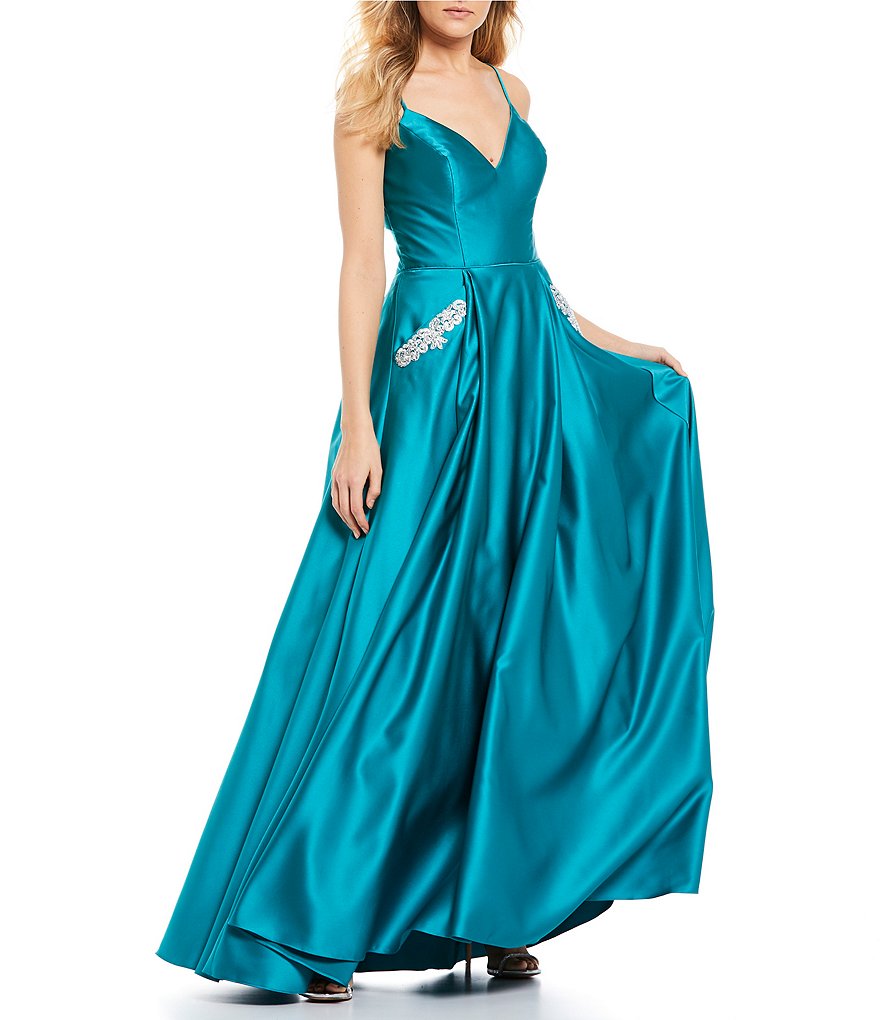 Blondie Nites Spaghetti Strap Lace-Up Back Beaded Pockets Satin Ball Gown