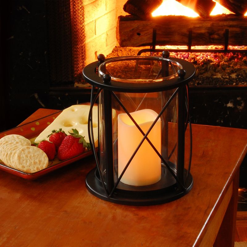 Round Metal LED Lantern With Criss Cross Design And Battery Operated Candle Black - LumaBase