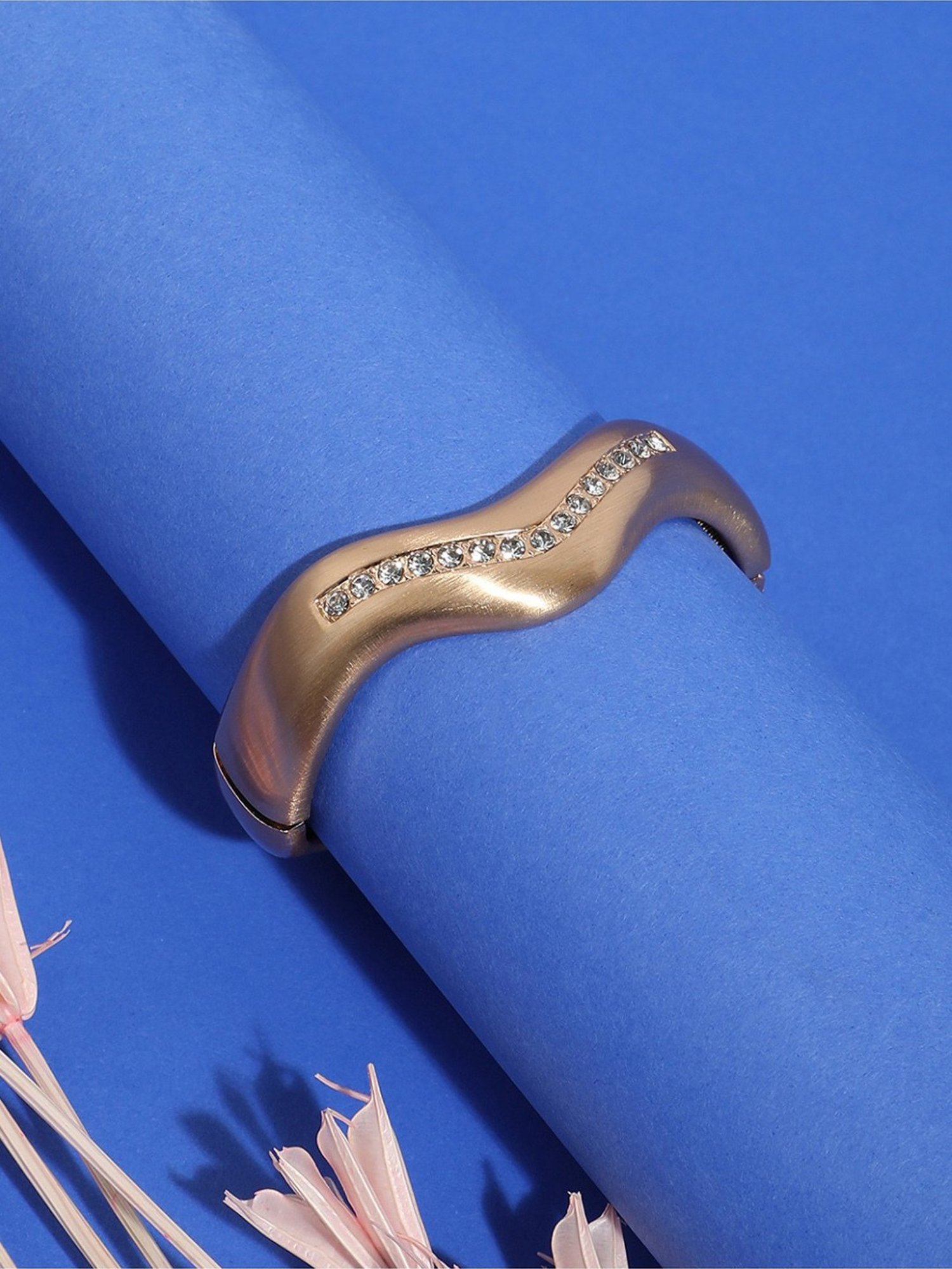 Sohi Embellished Swirl Golden Bracelet for Women & Girls