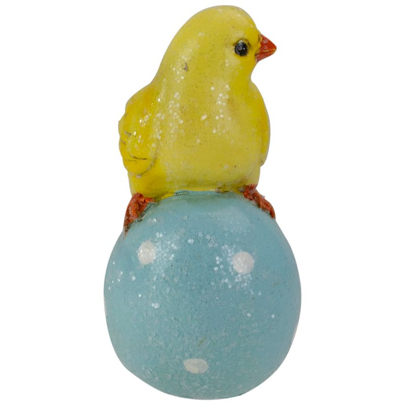 Darice 4" Yellow Chick Perched on a Blue Easter Egg Tabletop Decor