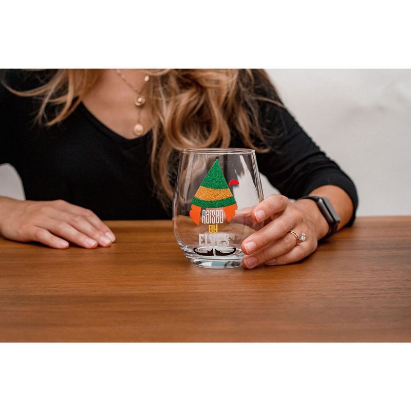 Silver Buffalo Buddy the Elf "Raised By Elves" Stemless Glitter Glass | Holds 20 Ounces