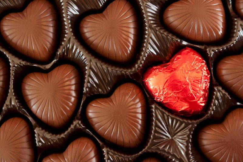 Valentine's Day Greeting Cards - Sweet Assortment - SA100. Business Greeting Card with an Image of Heart-shaped Chocolates. Box Set Has 25 Greeting Cards and 26 White with Red Foil Lined Envelopes.