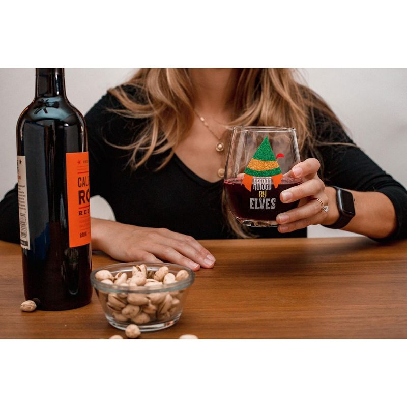 Silver Buffalo Buddy the Elf "Raised By Elves" Stemless Glitter Glass | Holds 20 Ounces