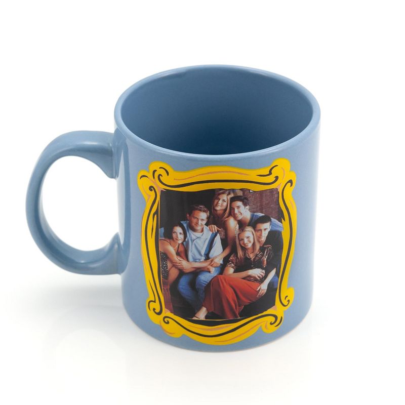 Silver Buffalo Friends Blue Coffee Mug | Friends Group In Monica's Frame | Cup Holds 20 Ounces
