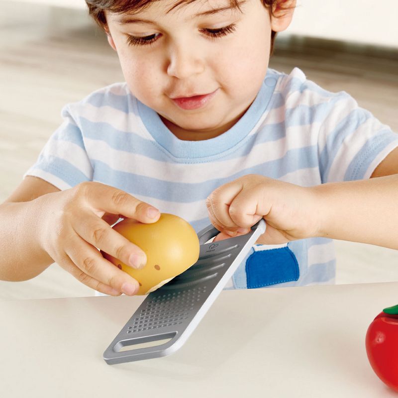 Hape E3154 Cooking Essentials Kids Wooden Pretend Kitchen Play Food Toys and Accessories Set with Vegetables, Cheese, Knife, Peeler, and Grater