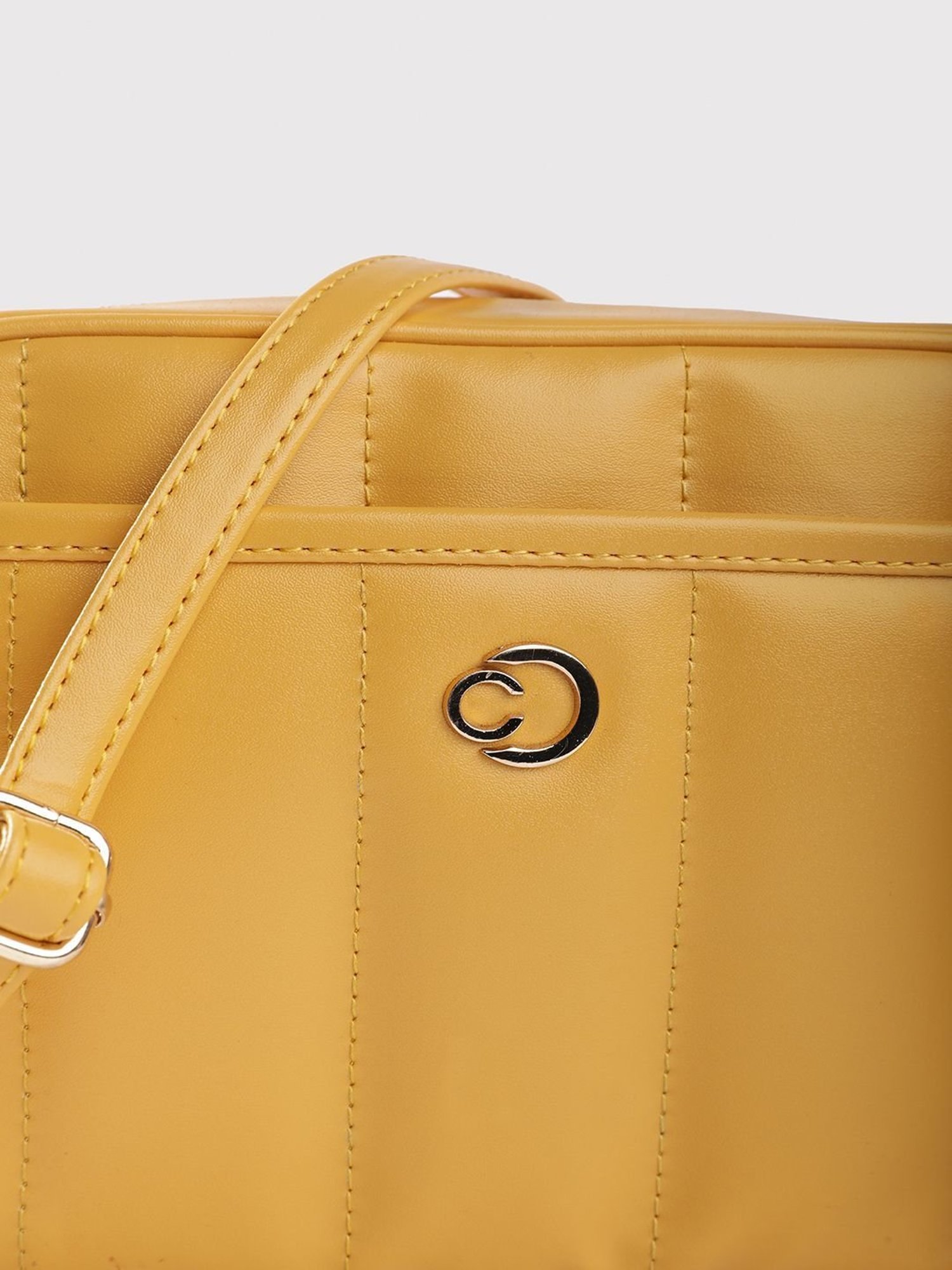 Caprese Poppy Fawn Faux Leather Quilted Sling Handbag