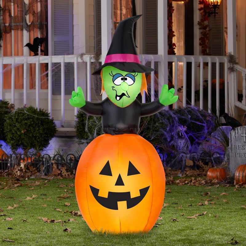 Gemmy Animated Airblown Spinning Witch in Pumpkin, 5.5 ft Tall, Multicolored