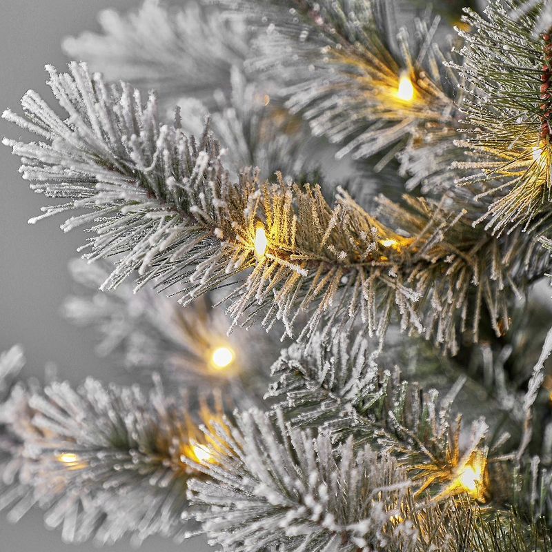 Home Heritage 7 Foot Snow Flocked Natural Pine Prelit Artificial Christmas Tree with Warm White Fairy Lights, On/Off Foot Pedal, and Metal Stand