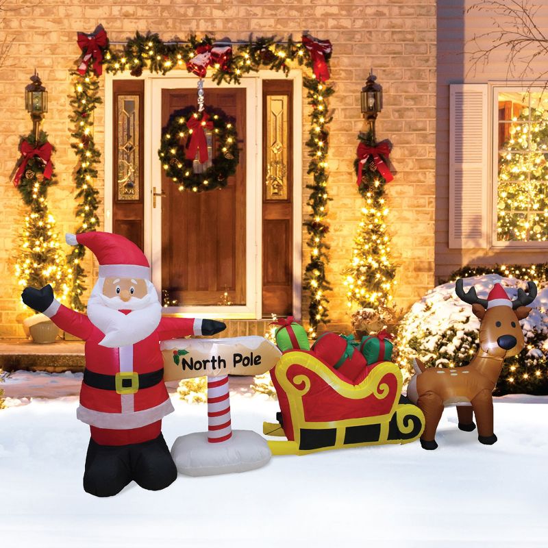 A Holiday Company Heavy Duty 9 Foot Wide Weather Resistant Self Inflatable Blow Up North Pole Scene Christmas Holiday Lawn Decoration with LED Lights