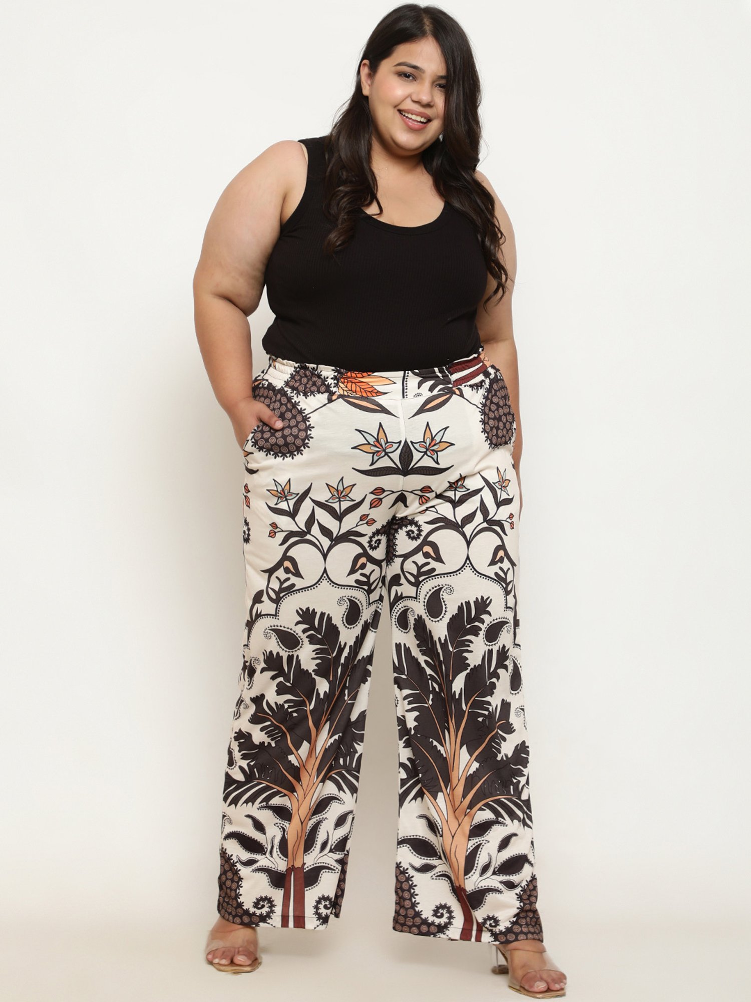 Amydus Off White Printed Flared Fit High Rise Pants