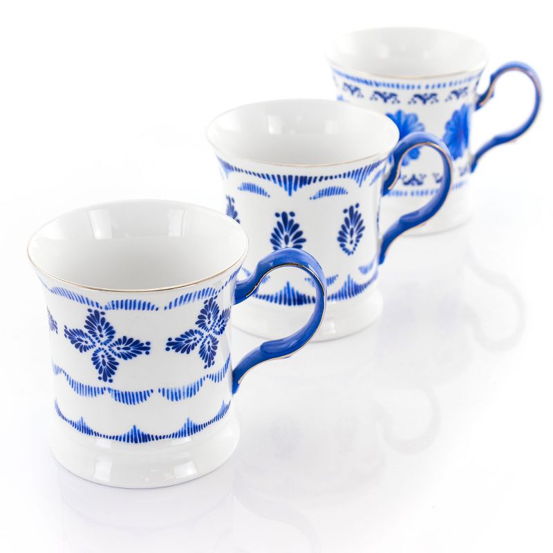 Meritage Navy 12 Piece 13.2 Ounce Fine Ceramic Cup Set in White with 4 Assorted Designs