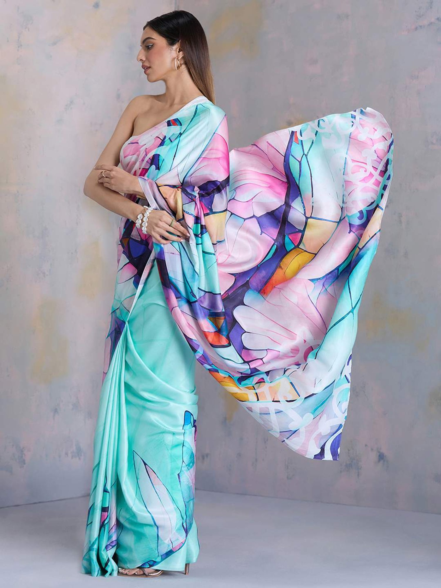 navyasa by liva Blue Printed Saree With Unstitched Blouse