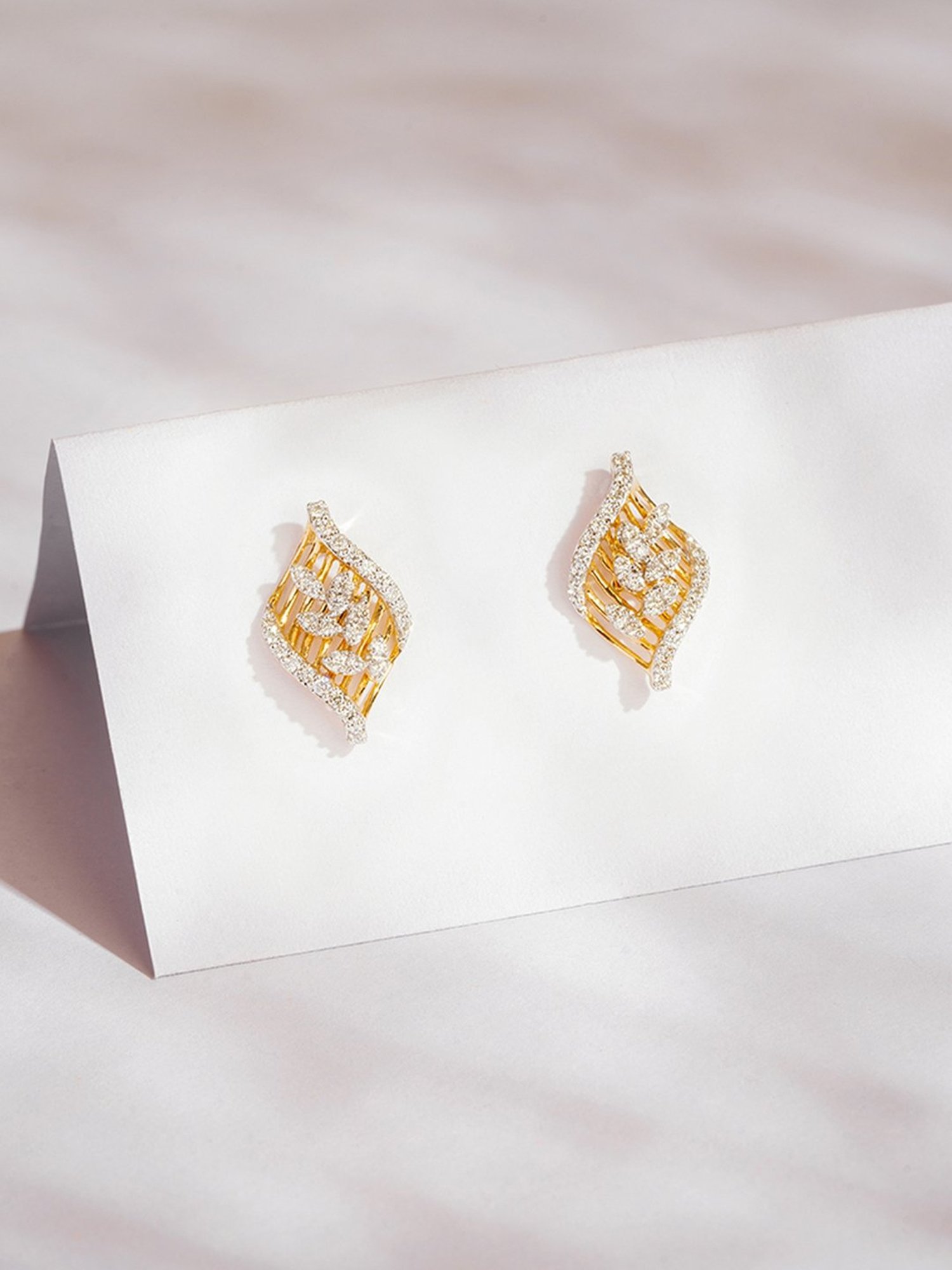 P.N.Gadgil Jewellers 14k Gold Twisted Leaf Stud Diamond Earrings For Women