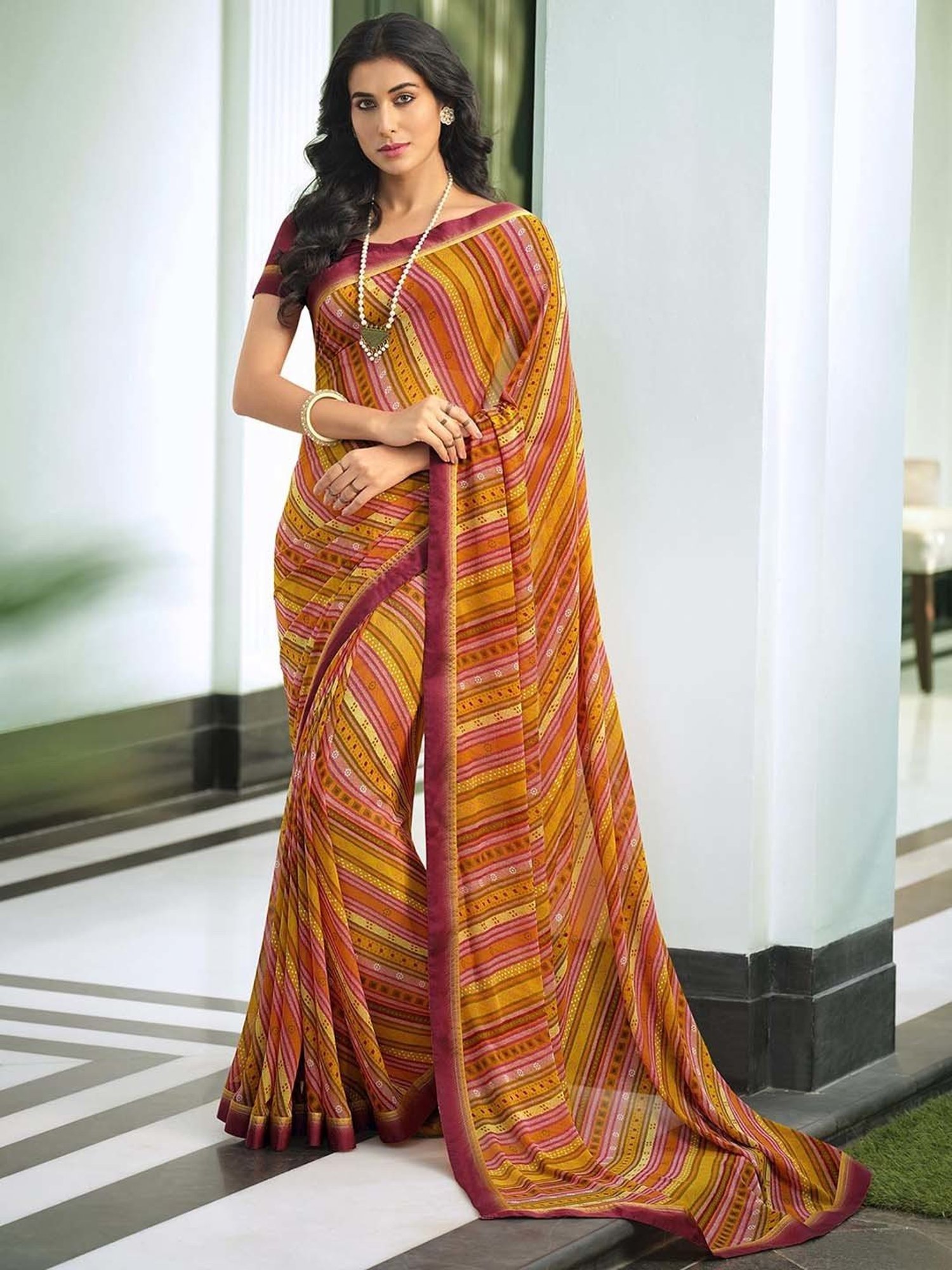 Rangita Orange Printed Saree With Blouse
