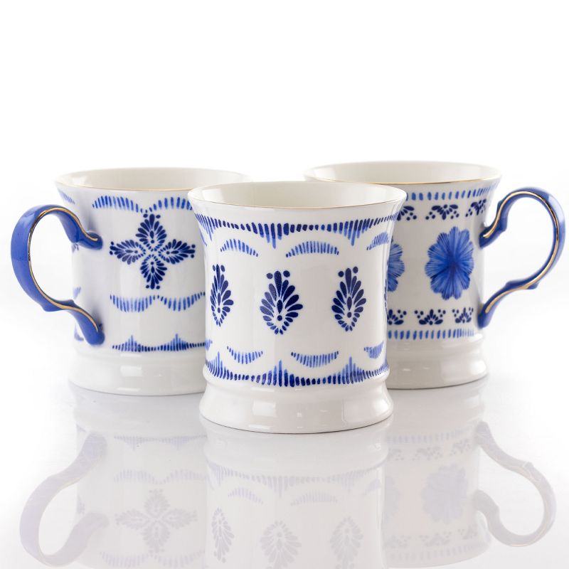 Meritage Navy 12 Piece 13.2 Ounce Fine Ceramic Cup Set in White with 4 Assorted Designs