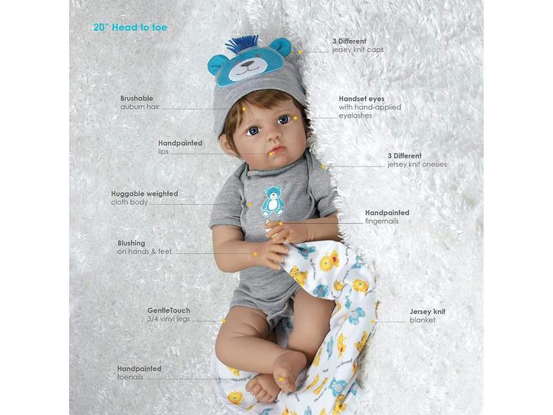 Paradise Galleries Reborn Baby Doll Boy "Lions & Tigers & Bears, Oh My!". Realistic baby is weighted and comes with 3 outfits. Kids 3+