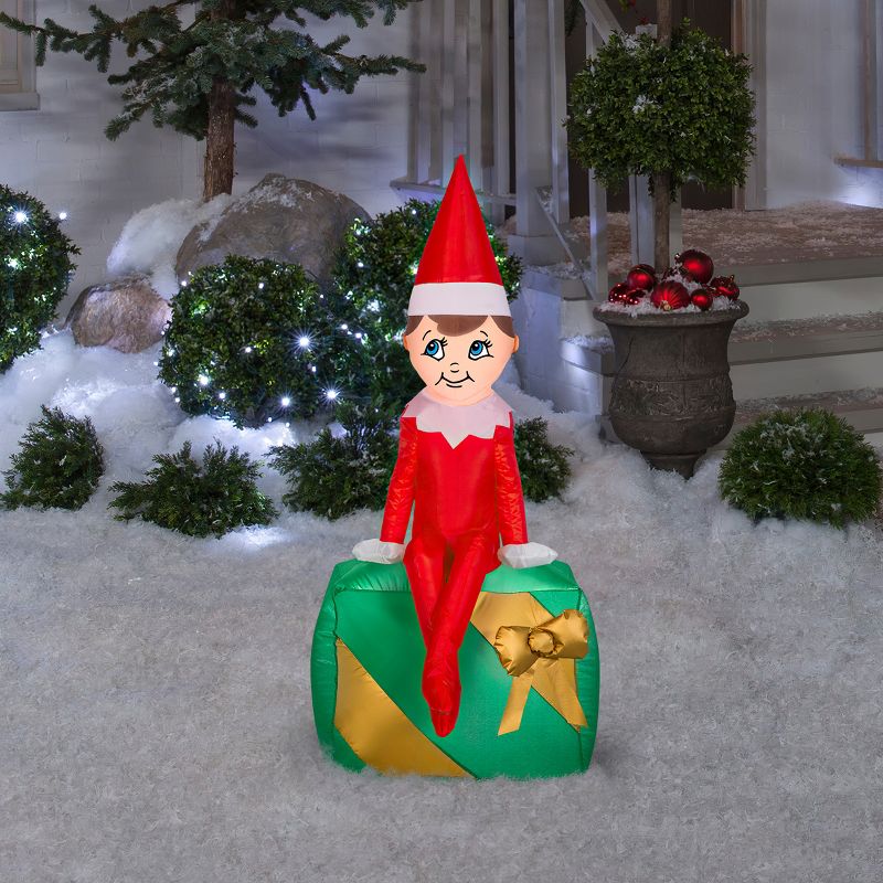 Gemmy Christmas Airblown Inflatable Elf on Present Elf on the Shelf, 3.5 ft Tall, Multicolored