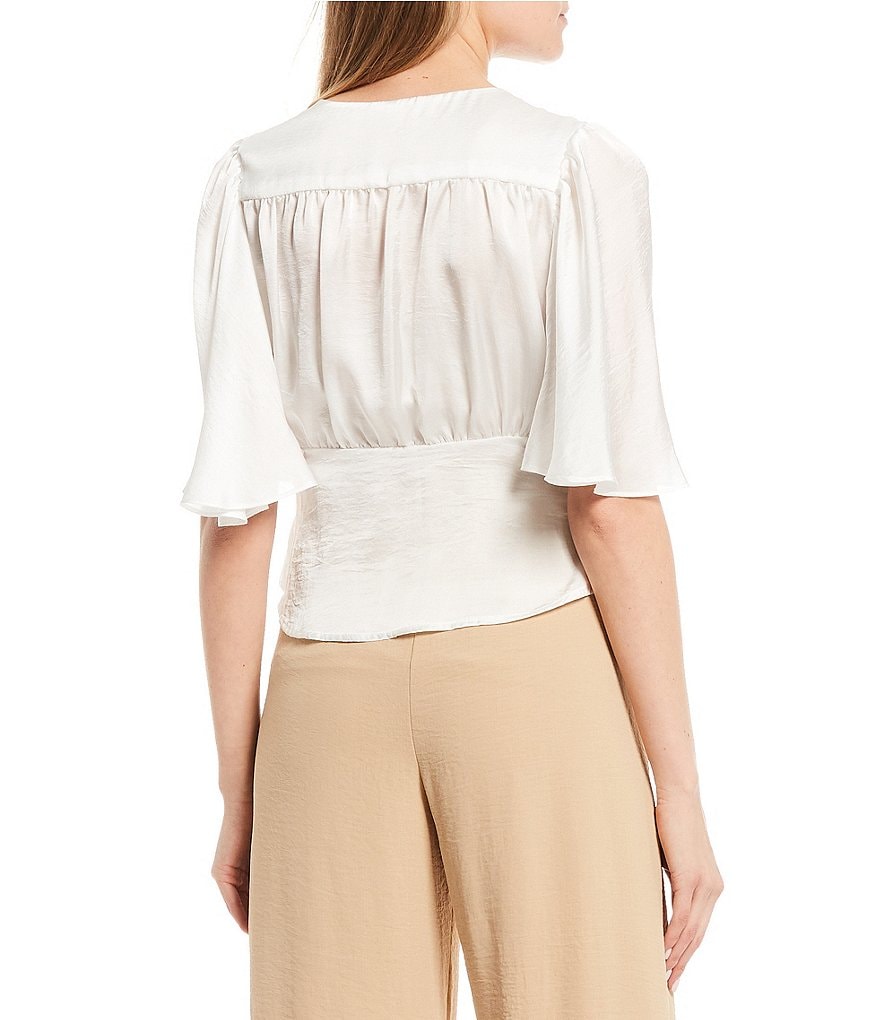 Evolutionary Satin Wash Button Front Peplum Top