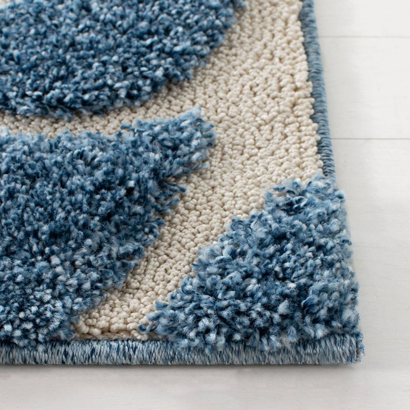 2'3"x9' Runner Swirl Loomed Rug Light Blue/Cream - Safavieh