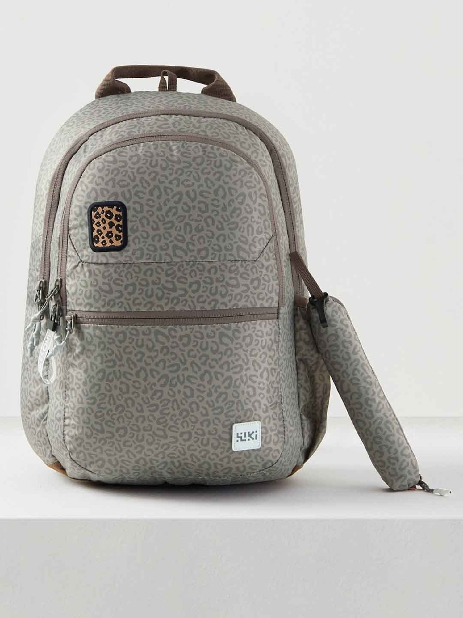 Wiki Back to School 1 Beige Polyester Printed Backpack - 22 Ltrs