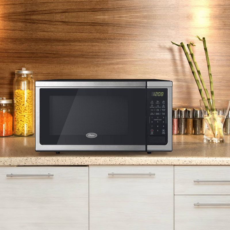 Oster 1.1 cu ft 1000W Microwave - Stainless Steel OGCMDM11S2-10